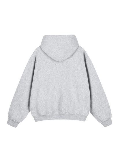 Hoodie with "Earn the look" print on the sleeves